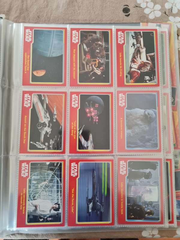 Star wars trading cards in collectors binder