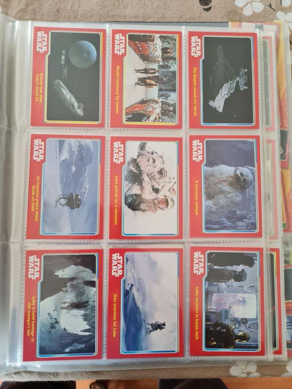 Star wars trading cards in collectors binder