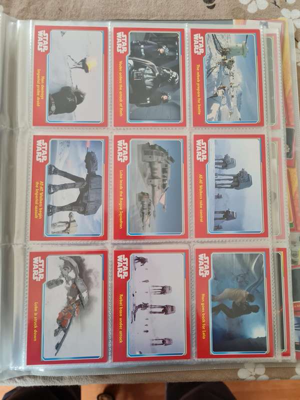 Star wars trading cards in collectors binder
