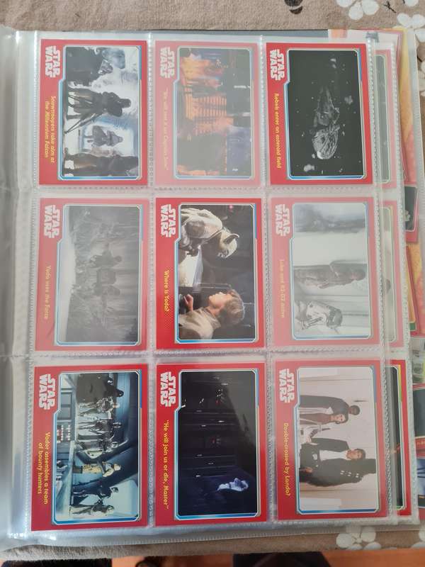 Star wars trading cards in collectors binder