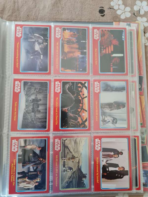 Star wars trading cards in collectors binder