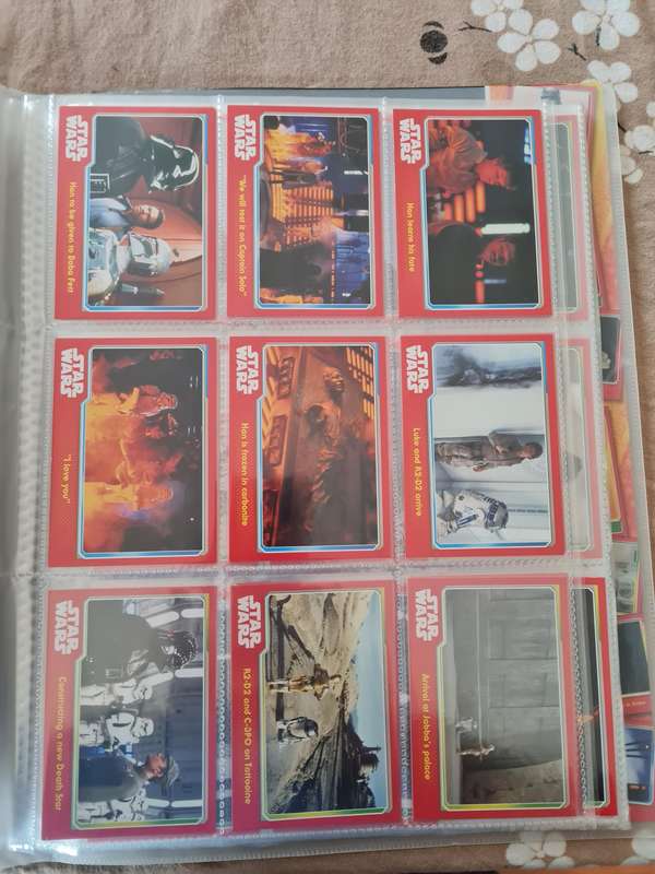 Star wars trading cards in collectors binder