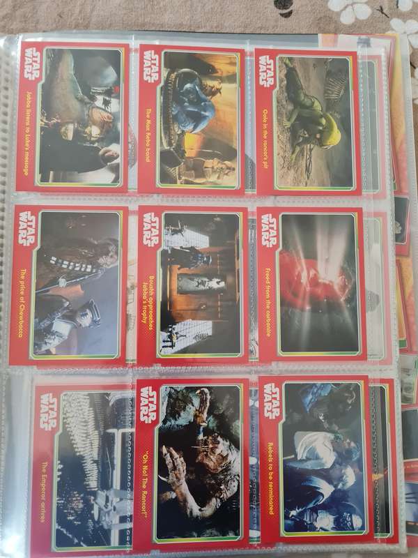 Star wars trading cards in collectors binder