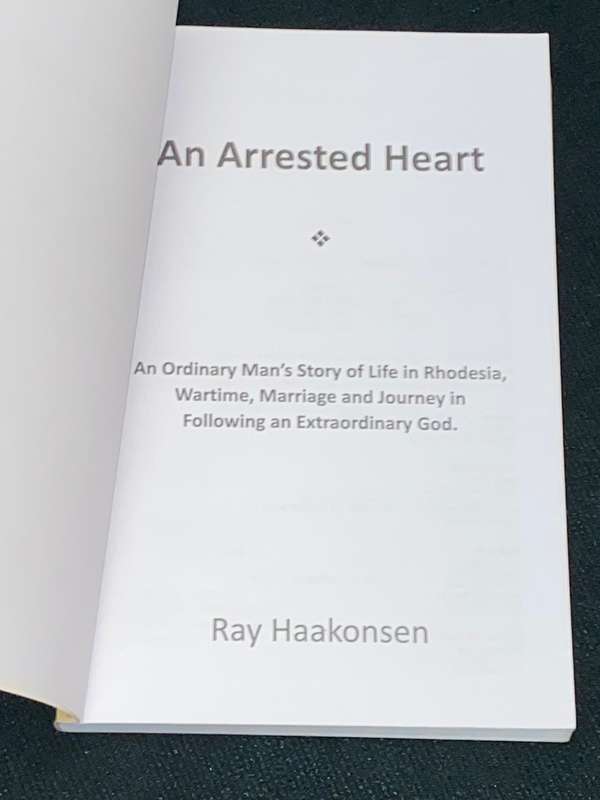 AN ARRESTED HEART  BY RAY HAAKONSEN SIGNED