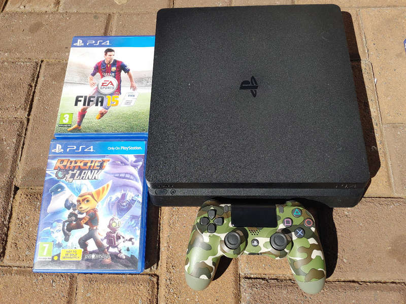 PS4 Slim 1tb console with 2x games and 1x controller