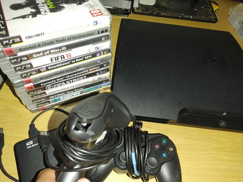 PS3 slim console with games and 2tb external hard drive