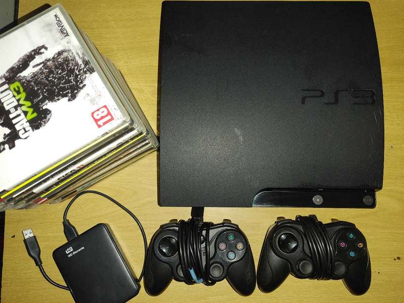 PS3 slim console with games and 2tb external hard drive