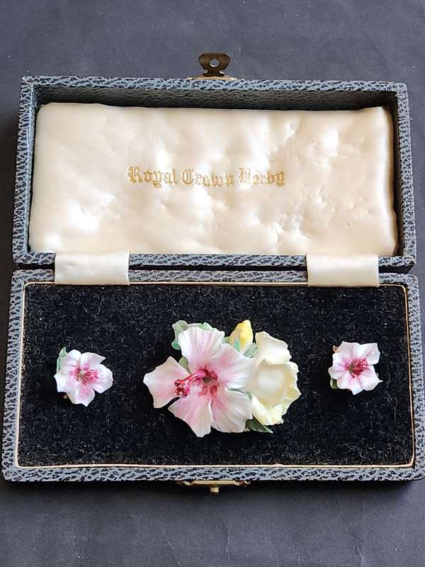 Royal Crown Derby Floral Brooch and Earrings set in a fitted Box (chips on brooch)-as per photograph