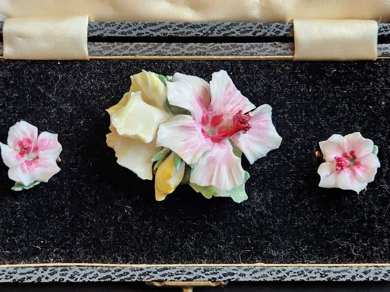 Royal Crown Derby Floral Brooch and Earrings set in a fitted Box (chips on brooch)-as per photograph