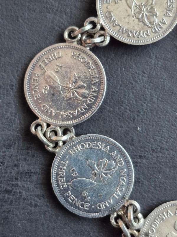 Rhodesia and Nysaland Tickey Bracelet  - 7 Threepences (various dates)