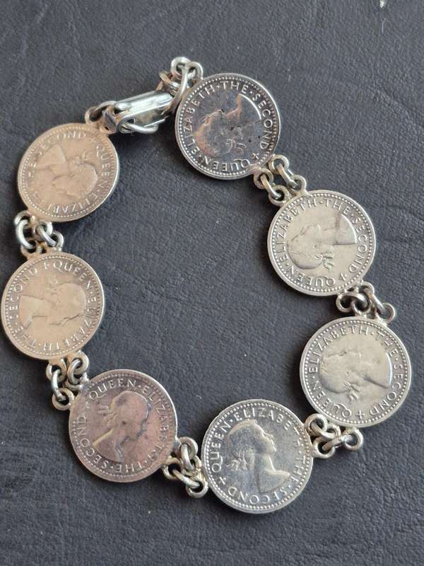 Rhodesia and Nysaland Tickey Bracelet  - 7 Threepences (various dates)