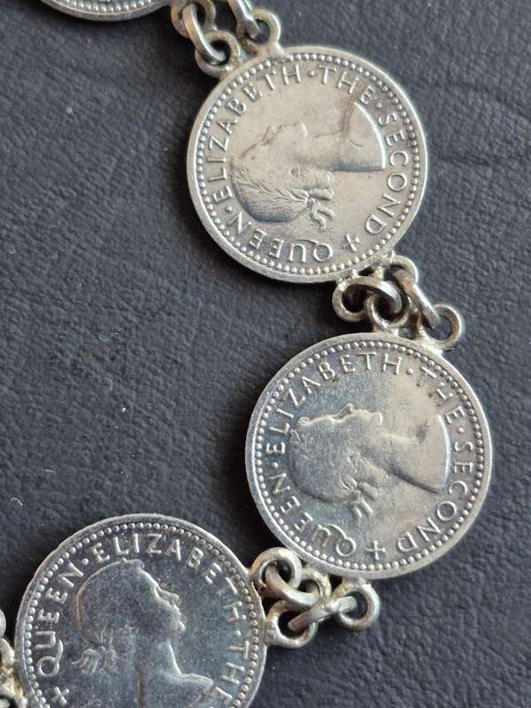 Rhodesia and Nysaland Tickey Bracelet  - 7 Threepences (various dates)