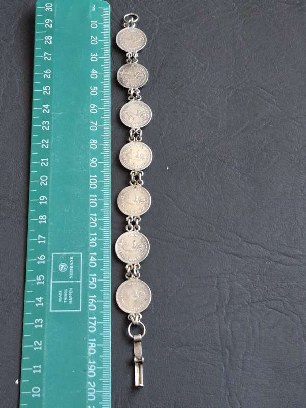 Rhodesia and Nysaland Tickey Bracelet  - 7 Threepences (various dates)