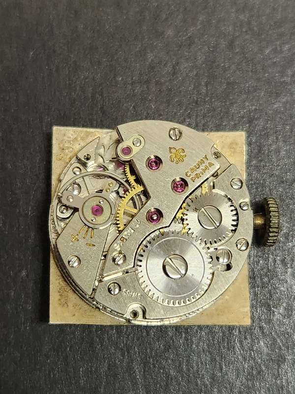 Vintage Cauny Prima Date 17 Jewels (17 Jewels) Mechanical Wrist Watch 10 Microns (not working)