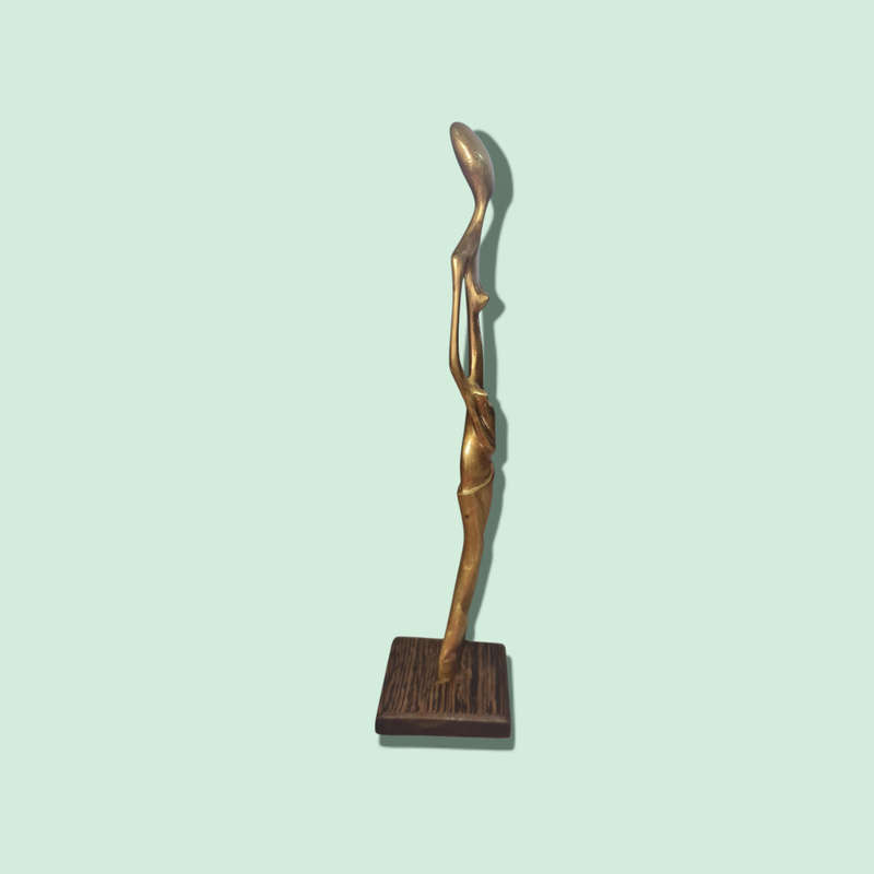 WOMAN BRASS FIGURINE