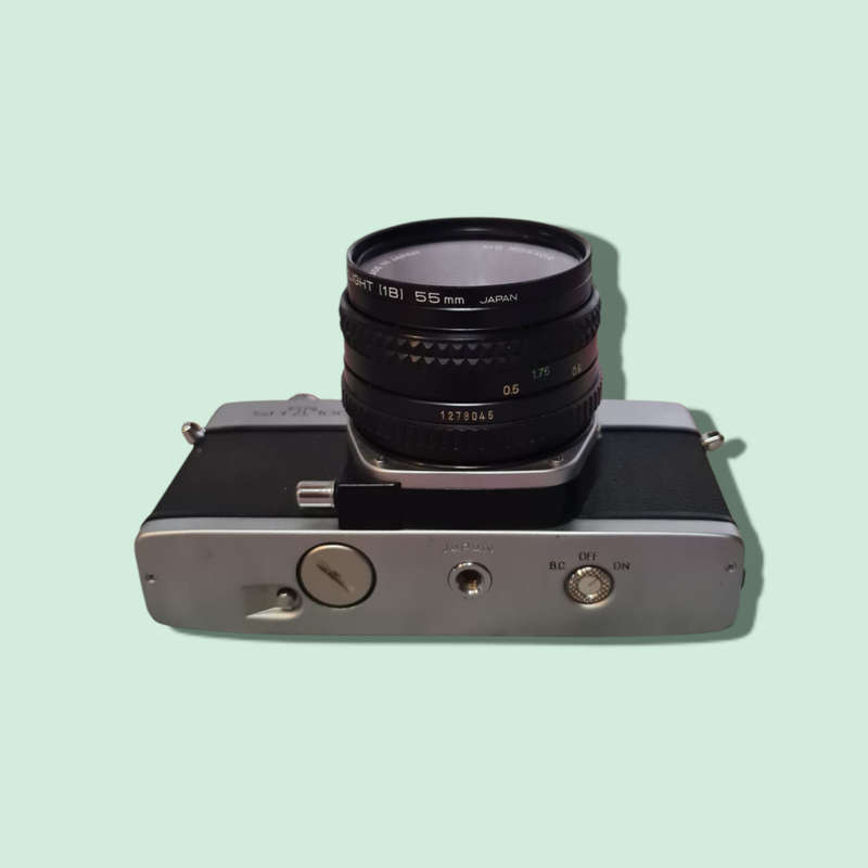 Vintage 35mm Minolta SRT100X Camera