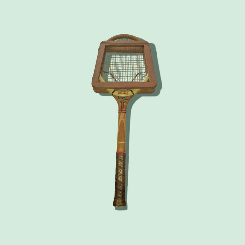 Retro Slazenger squash racquet with Dunlop wooden head guard