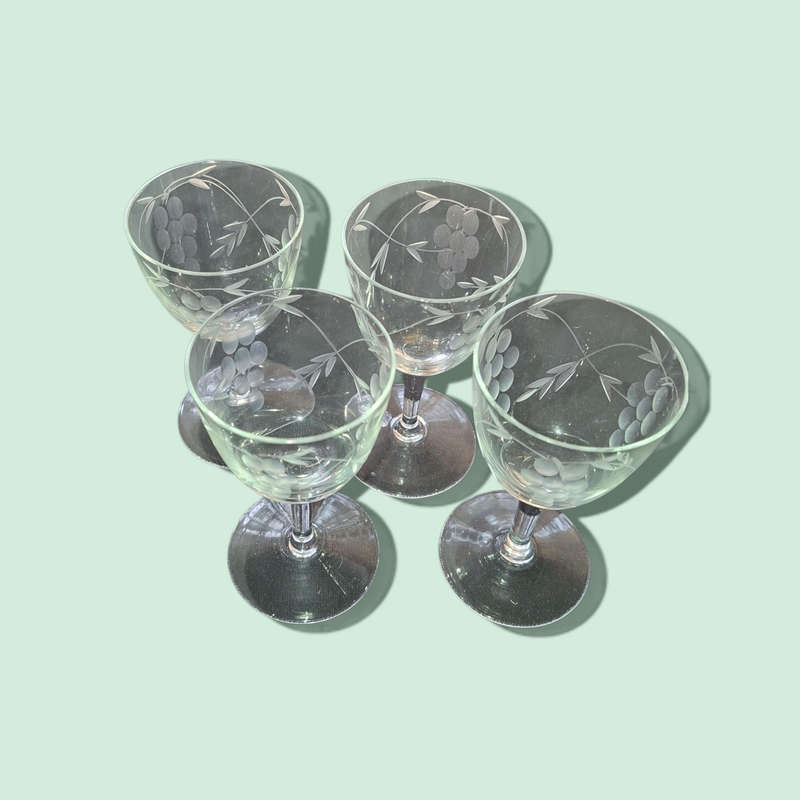 Sherry glasses with etched grapes motif