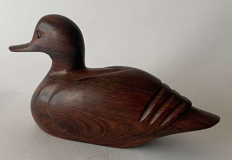 Hand carved Iorn wood duck dated and signed