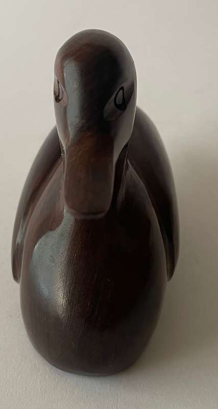 Hand carved Iorn wood duck dated and signed