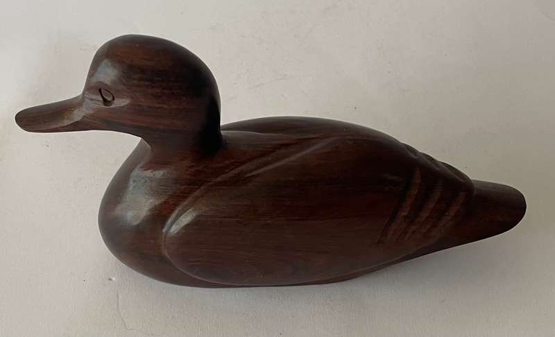 Hand carved Iorn wood duck dated and signed