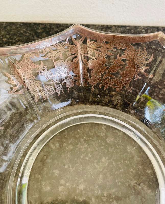 A stunning double handle glass bowl with silver inlay