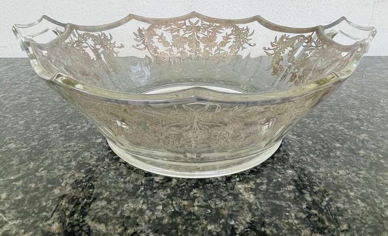 A stunning double handle glass bowl with silver inlay