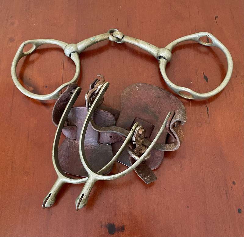 Pair of riding spurs and a Myler Baucher bit