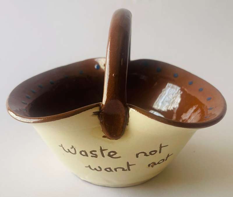 Darthmouth pottery from Devon - "Waste not Want not" serving dish.