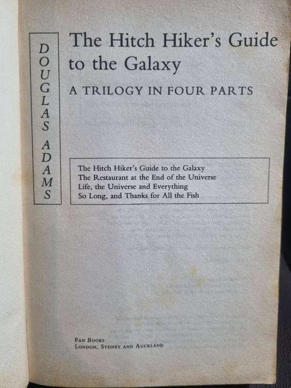 The Hitchhiker's Guide to the Galaxy - A Trilogy in Four Parts, by Douglas Adams
