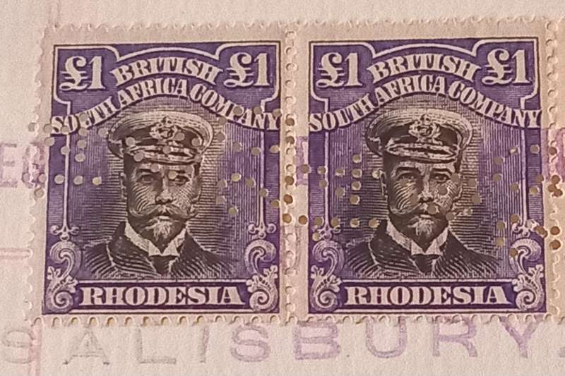 (80)Rhodesia(BSAC) 1913 1 Pound Pair On complete Deed of Transfer, incl. 5&10 Shillings all perfined