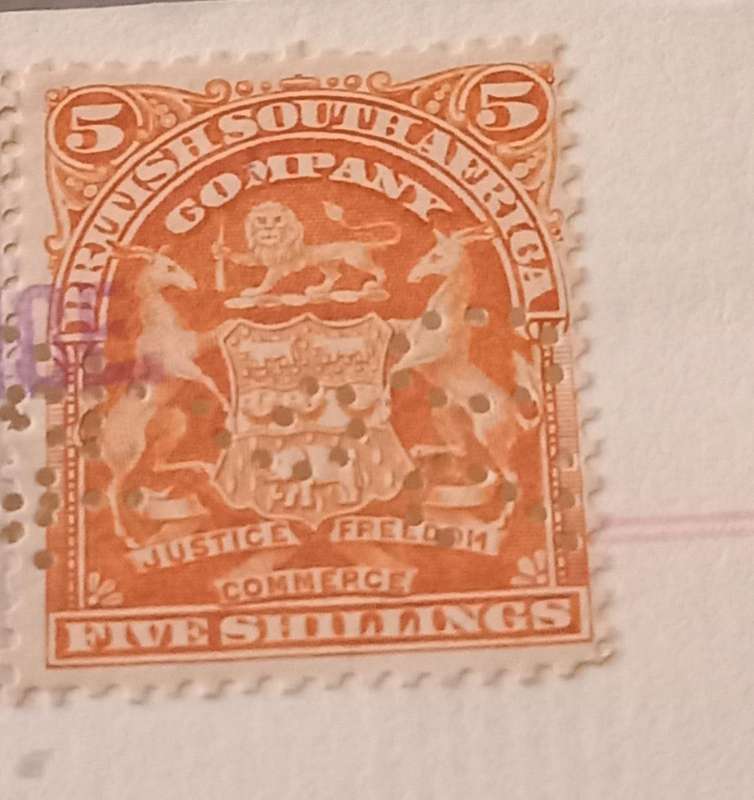 (80)Rhodesia(BSAC) 1913 1 Pound Pair On complete Deed of Transfer, incl. 5&10 Shillings all perfined