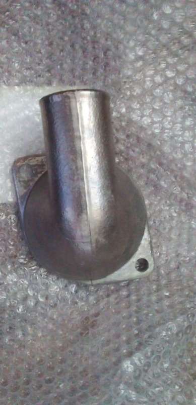 landcruiser genuine new thermostat housing.