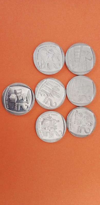 RSA SET OF 7 COMMEMORATIVE R2 COINS as per image.