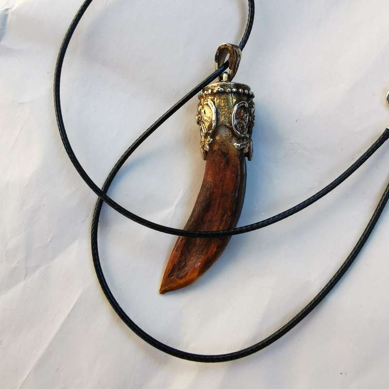Rare vintage sterling silver claw pendant