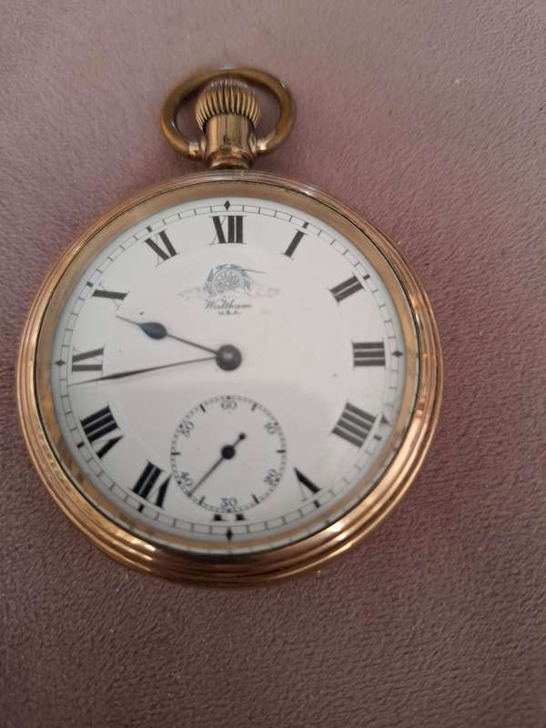 Waltham gold plated open face pocket watch, serial no 1977853, "The Russel model"