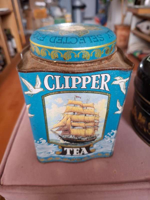 Clipper tea tin and Huttons Pine-apple Brand Hams and Bacon tin, 2 for price of 1