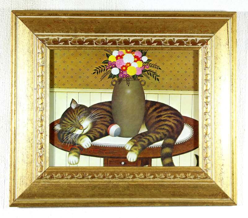 Print of cat sleeping on the table