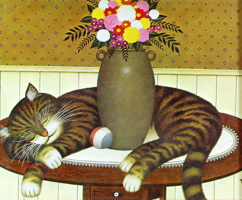 Print of cat sleeping on the table