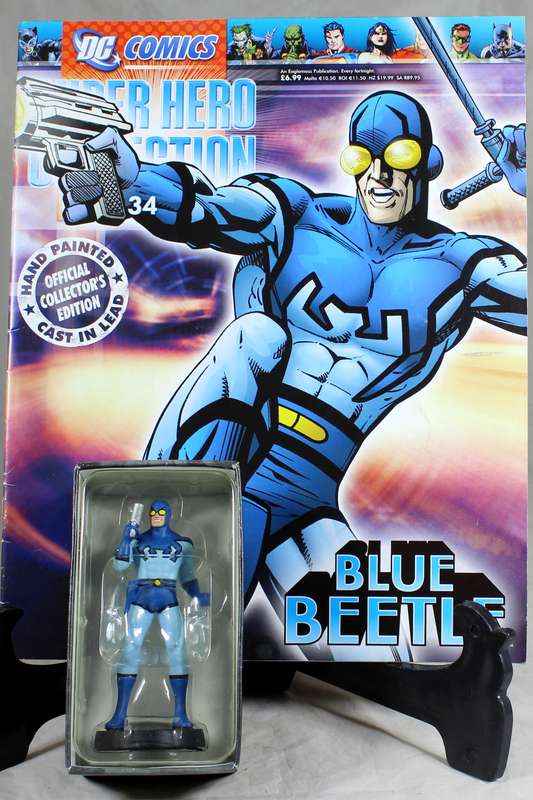 DC comics - lead, hand painted figurine with book - Blue Beetle #34