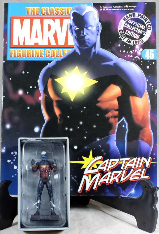 Marvel comics - lead, hand painted figurine with book - Captain Marvel #46