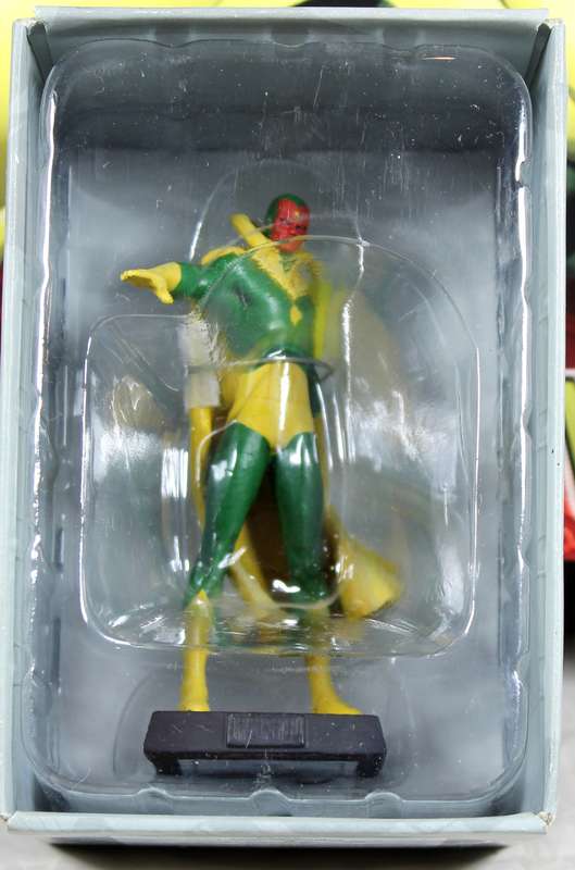 Marvel comics - lead, hand painted figurine with book - The Vision #48