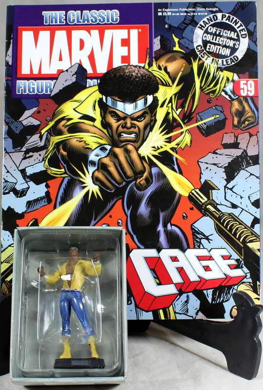 Marvel comics - lead, hand painted figurine with book - Luke Cage #59