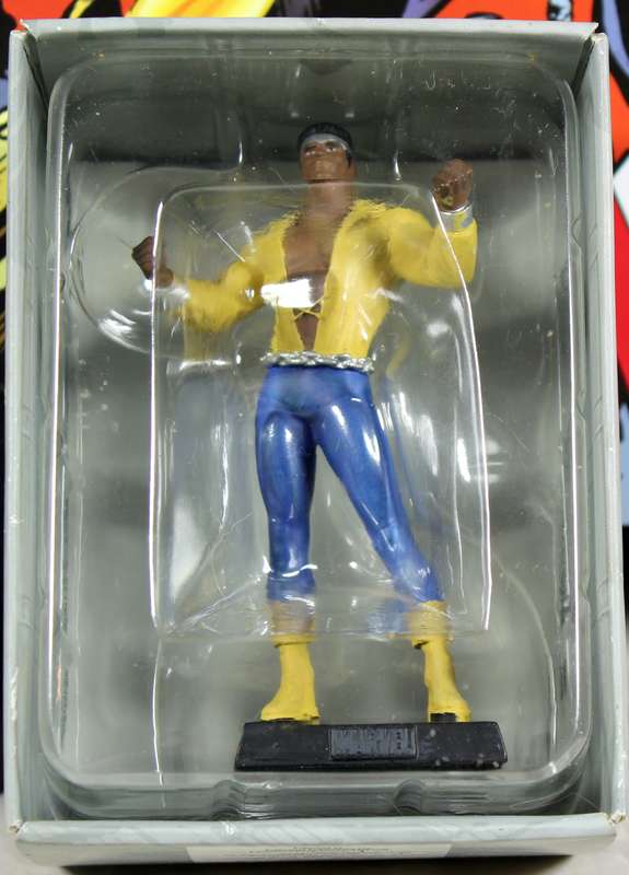 Marvel comics - lead, hand painted figurine with book - Luke Cage #59