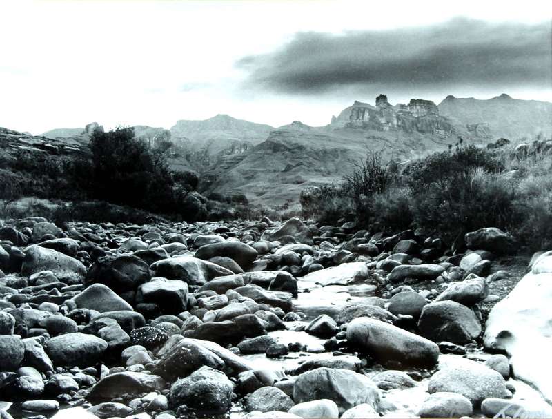 James Cousin - Artistic photo of bedrock in the river