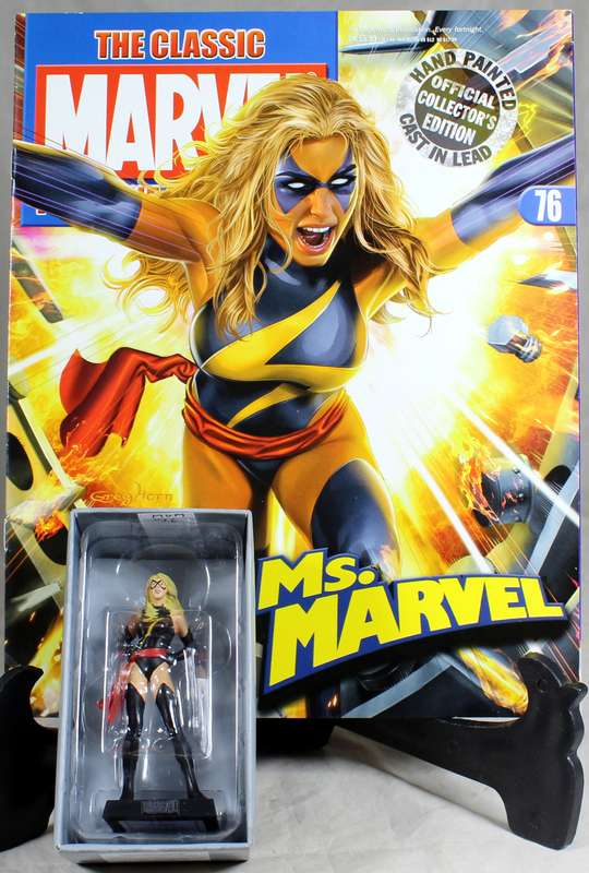 Marvel comics - lead, hand painted figurine with book - Ms. Marvel #76