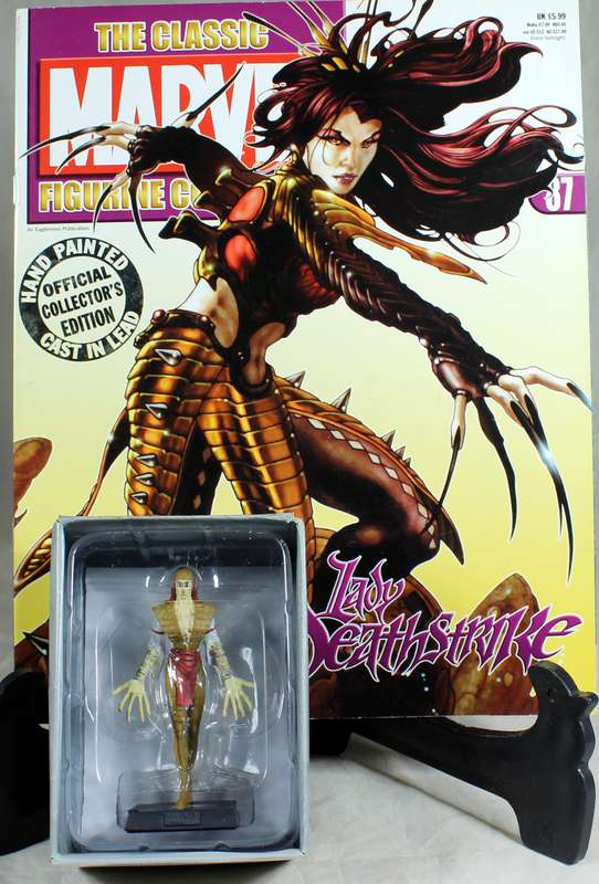 Marvel comics - lead, hand painted figurine with book - Lady Deathstrike #87