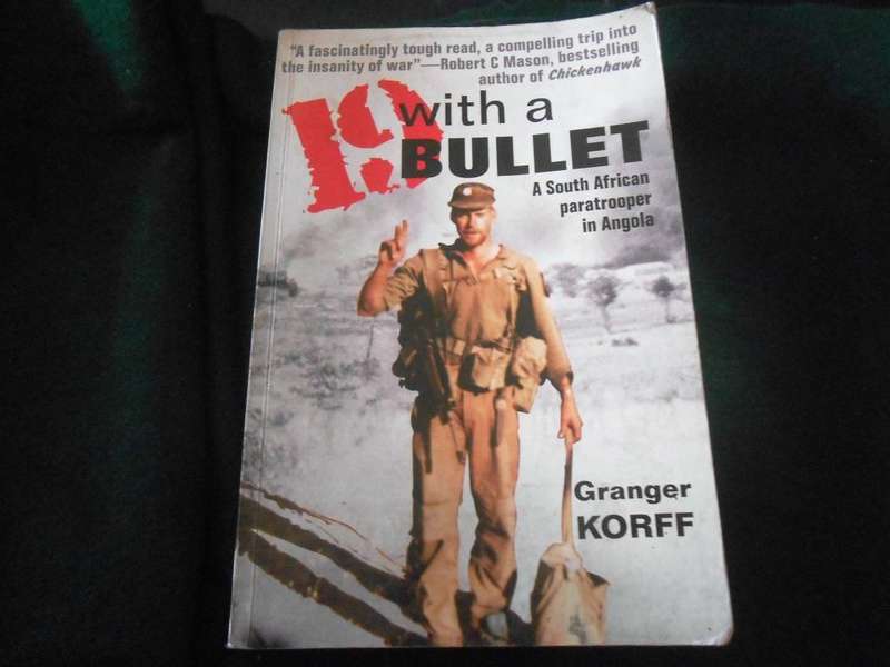 19 with a Bullet - Soft cover book (Book has marks and scuffs)