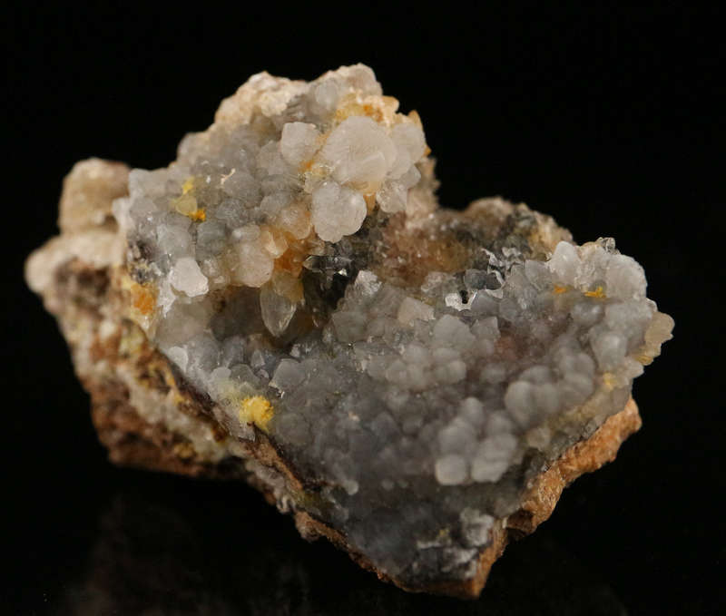 Calcite on Boltwoodite, Rossing Mine, Namibia
