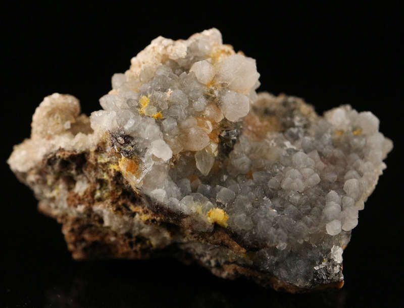 Calcite on Boltwoodite, Rossing Mine, Namibia